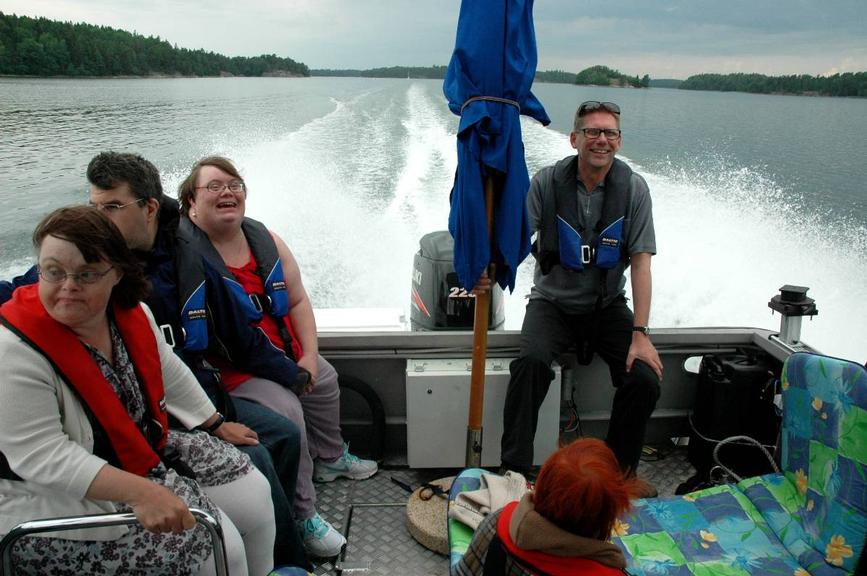 onboard photo of passengers in tour boat speeding across the archipelago 